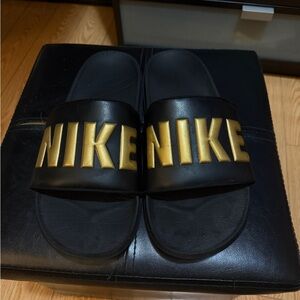 Nike Men's Black and Gold Slides